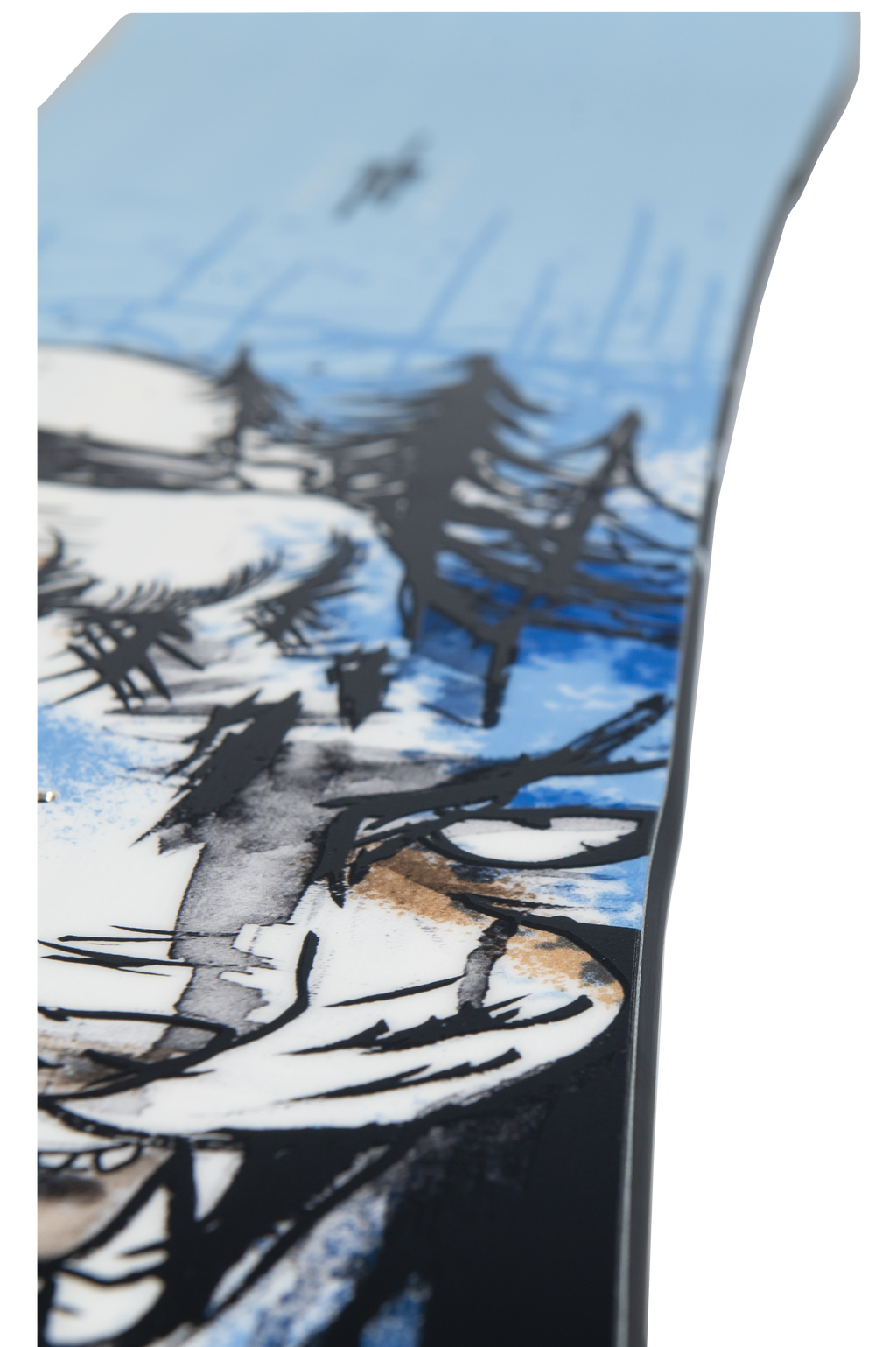 Steve's snow store Wollongong -Close-up of a snowboard with a winter landscape design featuring trees and mountains.