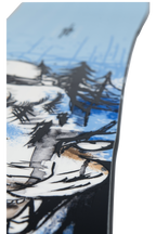 Steve's snow store Wollongong -Close-up of a snowboard with a winter landscape design featuring trees and mountains.