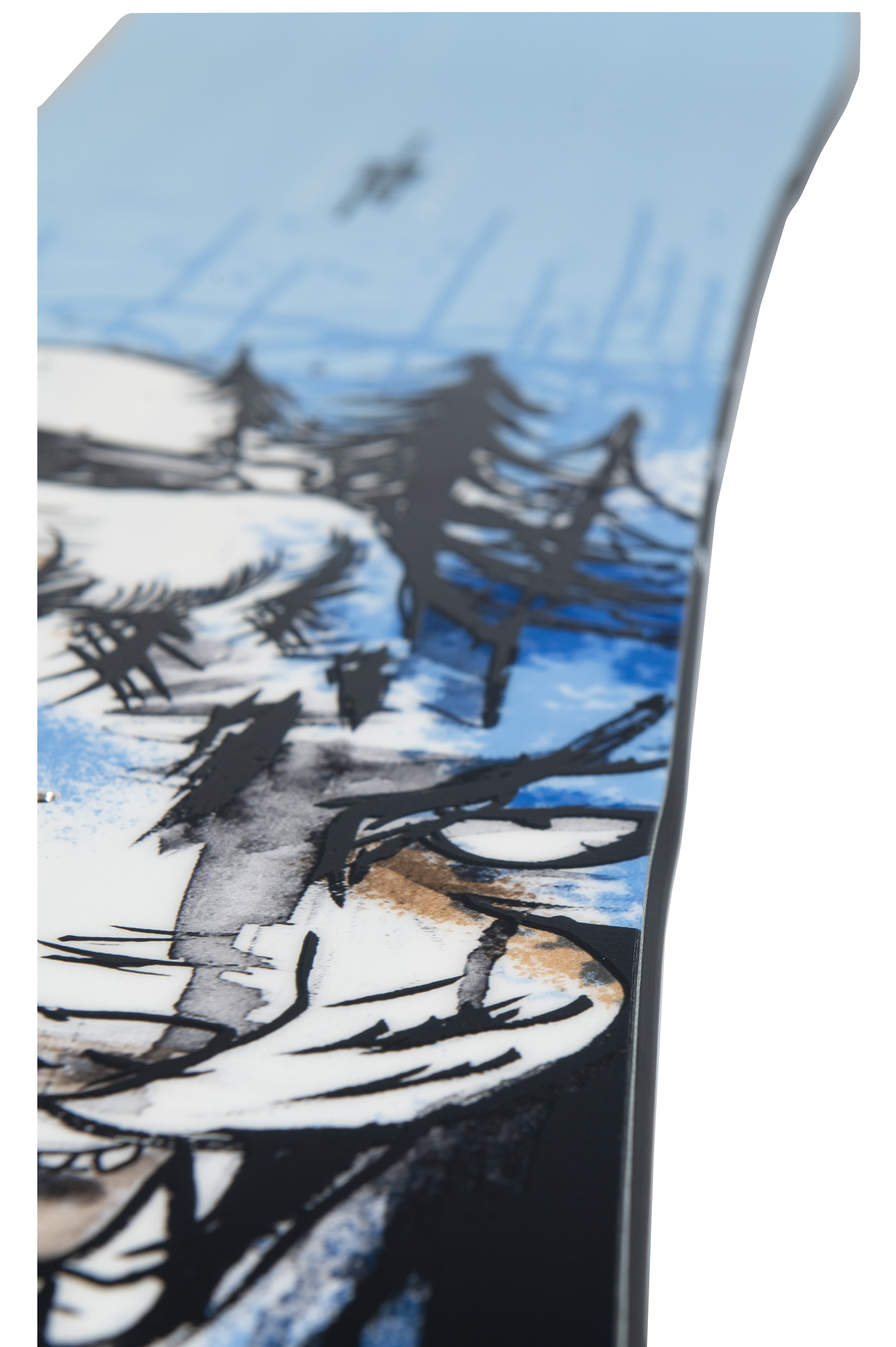 Steve's snow store Wollongong -Close-up of a snowboard with a winter landscape design featuring trees and mountains.