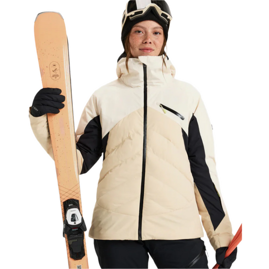 Model wearing Roxy Luna Frost ski jacket in butter cream colourway